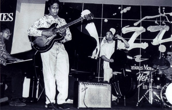 Herbie Hancock on piano and Arthur Gracias on guitar.